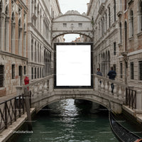 Ancient Venetian canal with ornate stone bridge and gondola