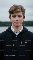 Teenage Boy in Casual Hoodie with Blue Eyes Near Waterfront