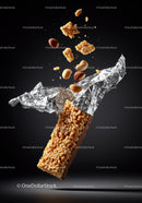 Crispy granola bar with nuts falling from wrapper
