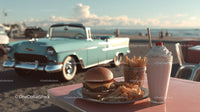 Vintage Car and Beachside Outdoor Dining Scene with Burger and Milkshake