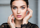 Close-Up of a Youthful Woman with Bright Blue Eyes and Natural Makeup