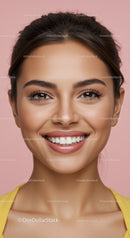 Confident young woman smiling against pastel background