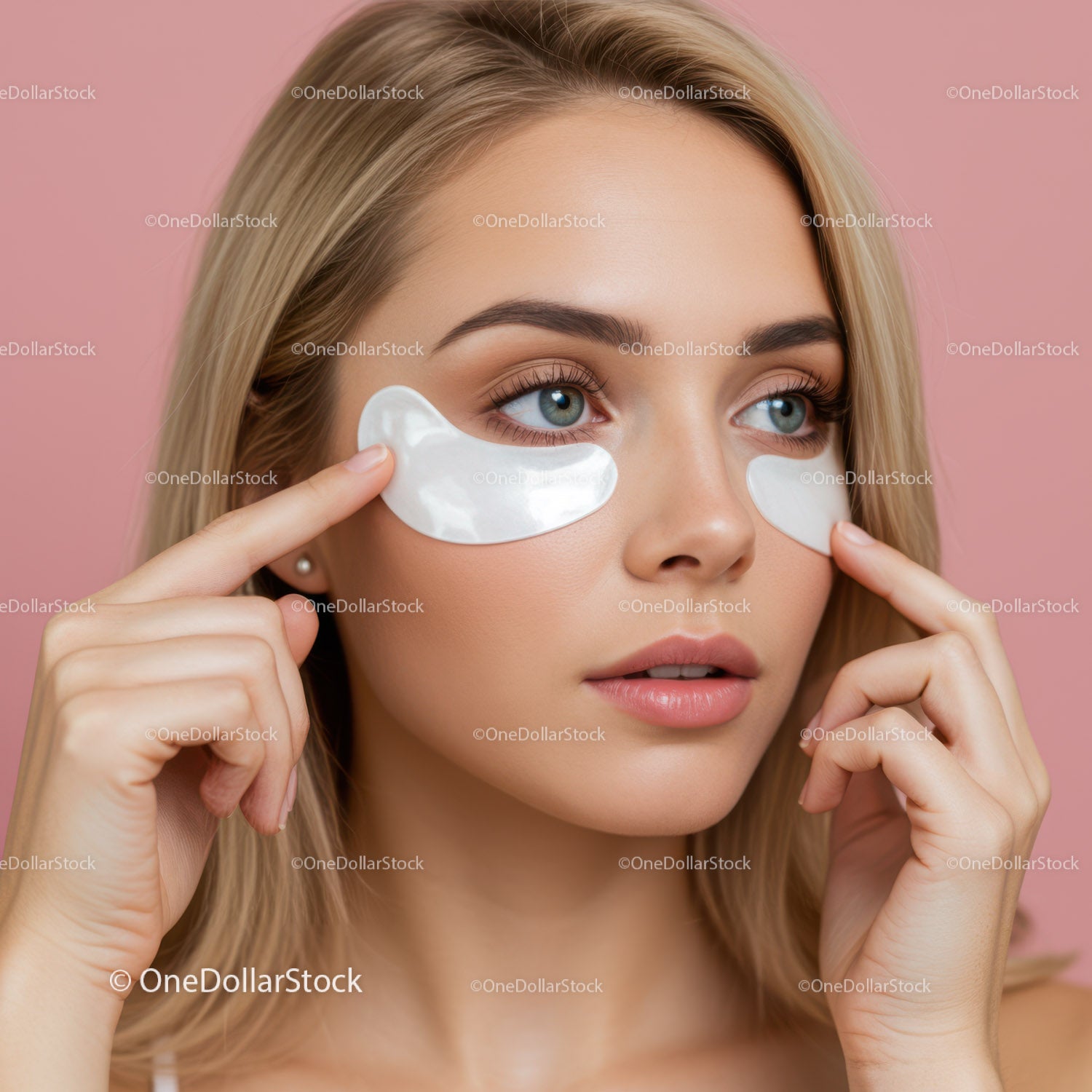 Beauty Woman Applying Under Eye Patches for Skin Rejuvenation