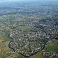 Aerial View of a Town with Green Fields and River