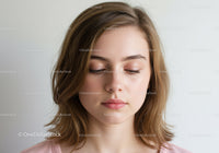 Serene Young Woman with Natural Makeup and Soft Expression