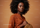 Elegant African American Woman in Brown Silk Blouse with Statement Jewelry