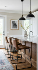 Bright Modern Kitchen with Leather Bar Stools and Natural Light