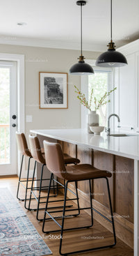 Bright Modern Kitchen with Leather Bar Stools and Natural Light