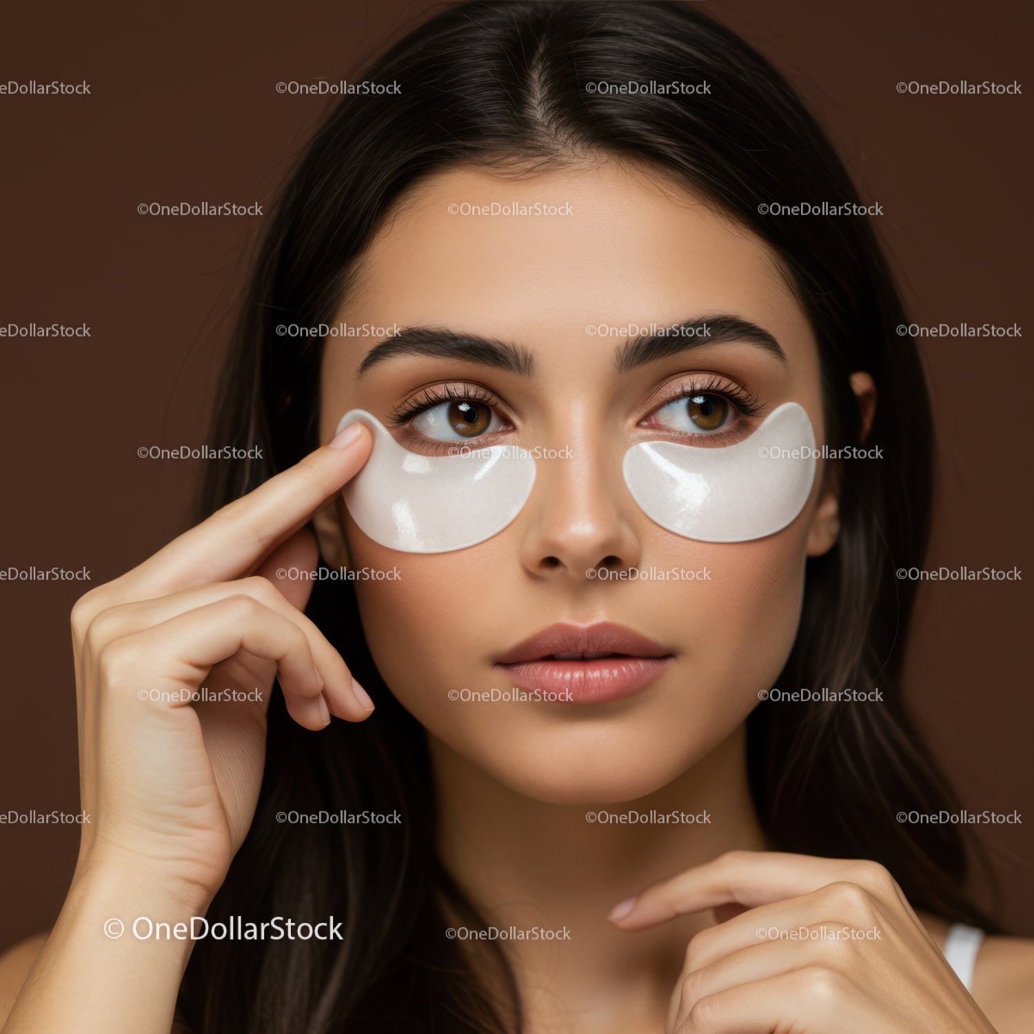 Young Woman Applying Eye Patches for Skin Care Facial