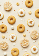Assorted Light Cookies and Rice Cakes on Beige Background