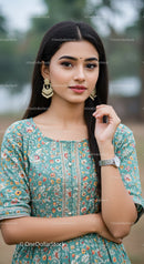 Elegant woman in traditional floral dress with jewelry outdoors