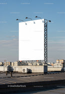 Large Blank Billboard on Urban Rooftop at Daytime