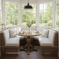 Cozy breakfast nook with natural light and garden view