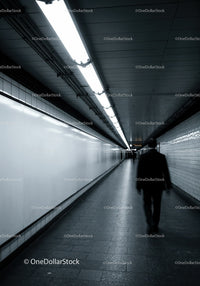 Minimalist Subway Tunnel with Tiled Walls and Modern Lighting
