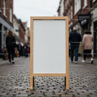 Blank Wooden Frame Sign on Urban Cobblestone Street