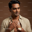 Male skincare routine with moisturizer application on chest for healthy skin