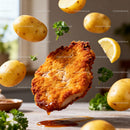 Crispy Breaded Cutlet with Fresh Potatoes and Lemon