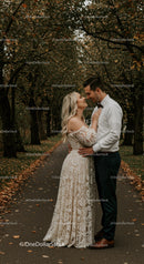 Romantic couple embracing on autumn tree-lined path
