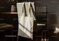 Canvas tote bag hanging on cozy dining chair