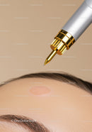 Close-up of a cosmetic pen treating skin on forehead with Beauty Technology