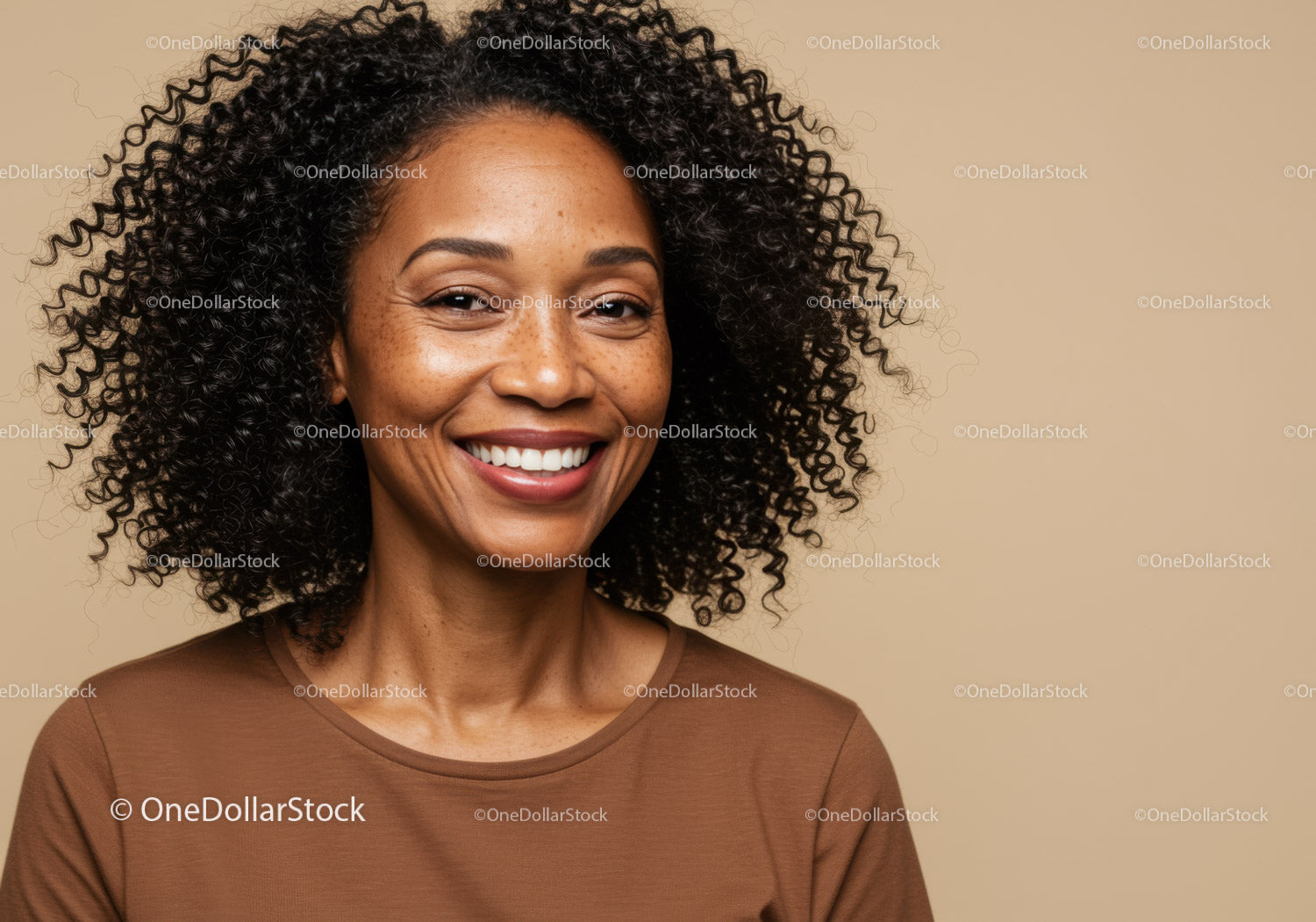 Smiling African Woman with Curly Hair in Casual Outfit on Beige Background