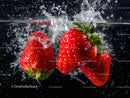 Juicy Fresh Strawberries Splashing into Water in Vibrant Scene