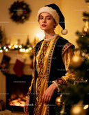 Young woman in festive costume and Santa hat indoors