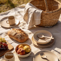 Cozy Outdoor Picnic Setup with Fresh Bread and Fruit