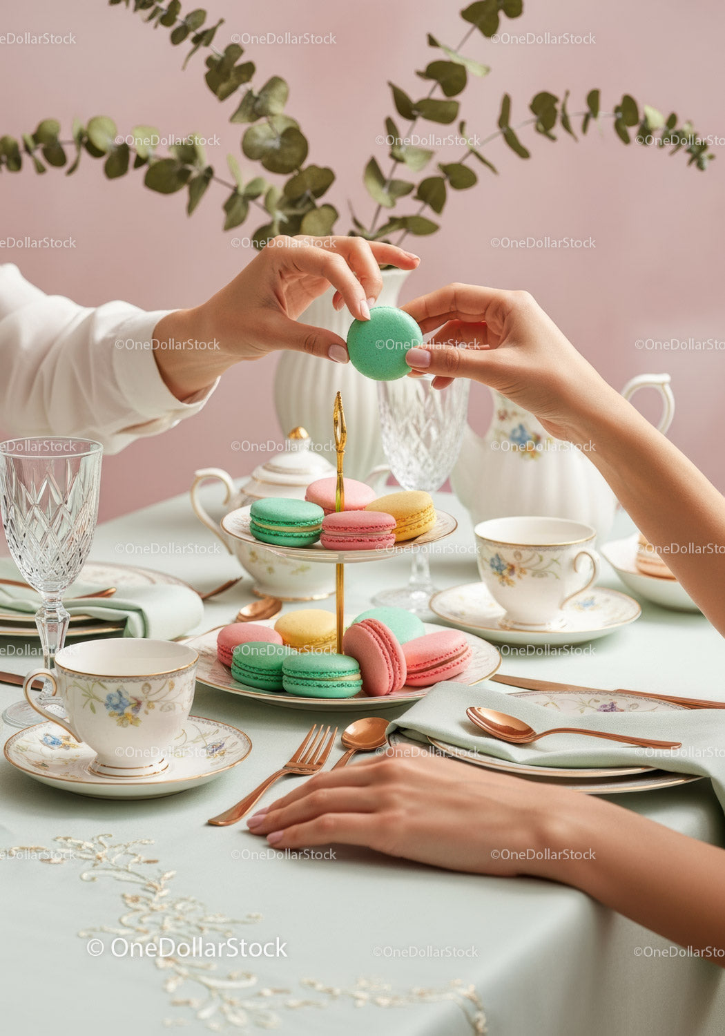 Elegant Afternoon Tea Table with Macarons and Floral Decor