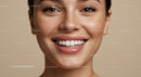 Close up of smiling woman with natural freckles