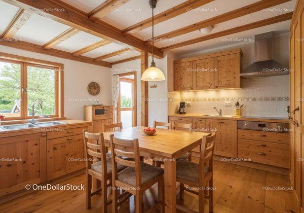 Rustic Wooden Kitchen with Dining Area and Natural Light
