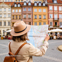 Traveler Exploring City Streets with Map in Hand