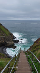 Staircase Leading to Dramatic Coastal Cliffs and Ocean View
