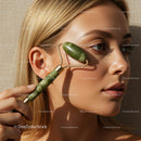 Young Woman Using Jade Roller for Glowing Skin Facial Massage