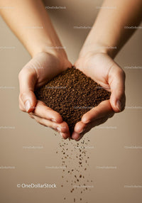 Hands Gently Holding Pouring Coffee Granules