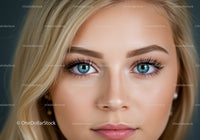 Close up of young blonde woman with blue eyes