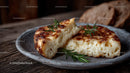 Creamy Cheese Fondue with Herbs on Rustic Plate