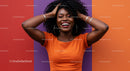 Vibrant Portrait of Smiling Black Woman with Curly Hair Against Colorful Background
