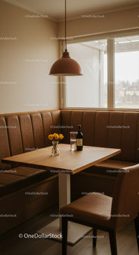 Warm Modern Cafe Interior with Leather Seating and Bright Window