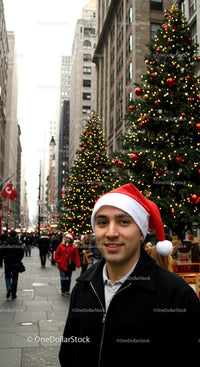 Man Wearing Santa Hat in Festive Urban Christmas Scene