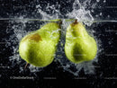 Fresh Green Pears Splashing in Water with Dynamic Droplets
