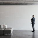 Businessman walking in modern minimalist interior space