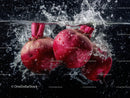 Red Radishes Splashing in Water with Dynamic Freshness