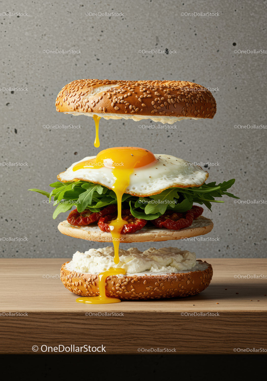 Sesame Bagel Sandwich with Fried Egg and Fresh Greens