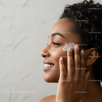 Smiling Woman Using Cotton Pad for Facial Skincare