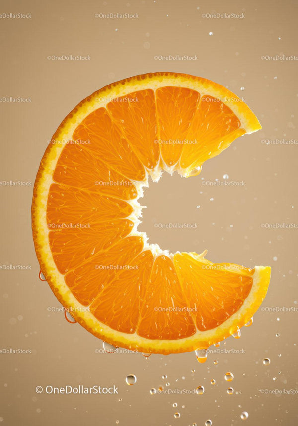 Close up of fresh orange slice with water droplets