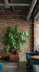 Modern Urban Interior with Green Monstera and Leather Sofa