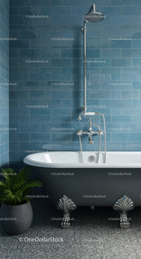 Classic Clawfoot Bathtub with Blue Tiled Wall and Plant