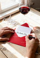Writing a Love Note with Glass of Red Wine Nearby