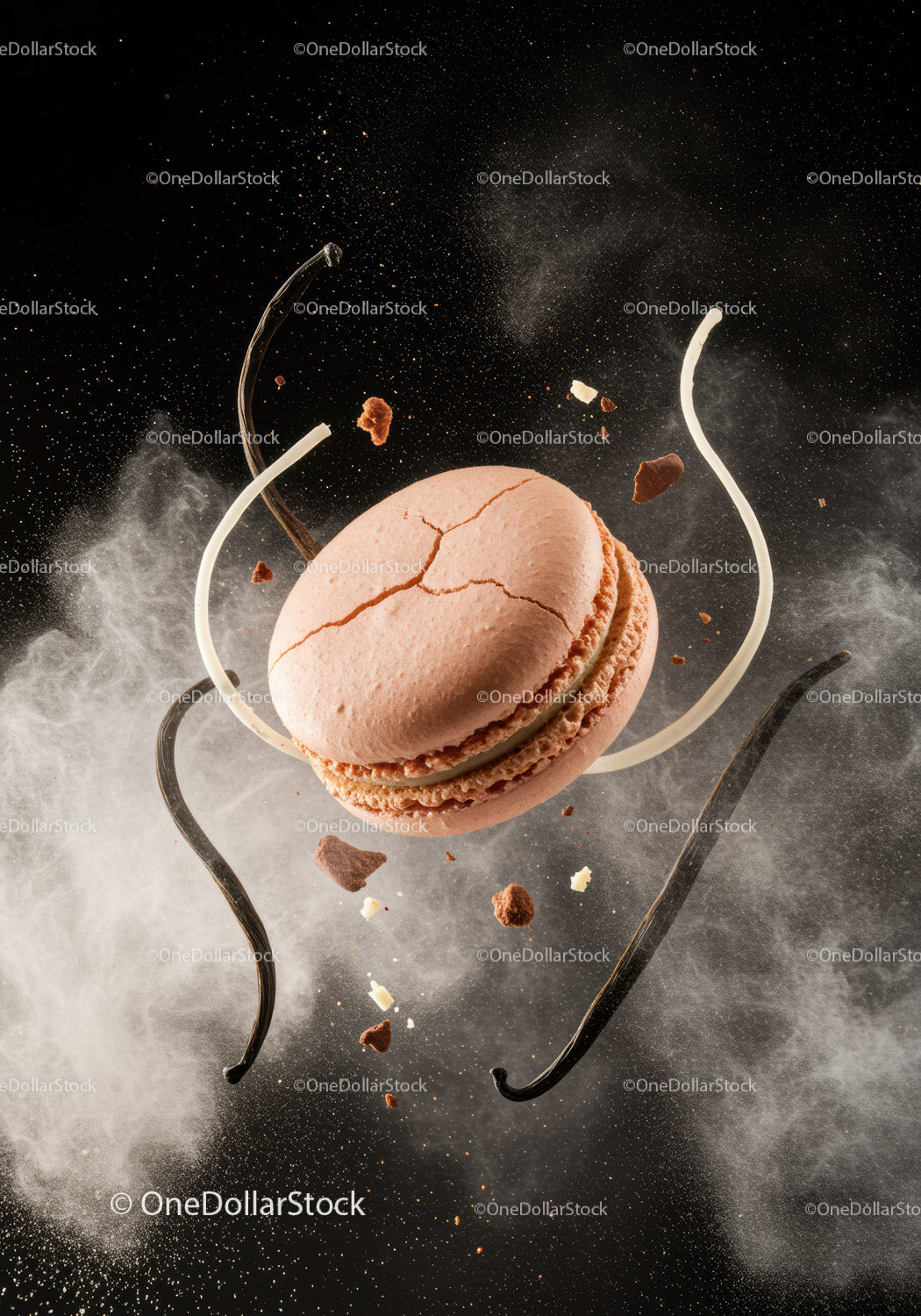 Cracked Pink Macaron with Vanilla Beans in Air